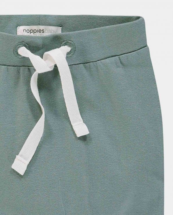Pantalón cómodo de algodón orgánico para bebé y niño moderno color básico de la marca Noppies